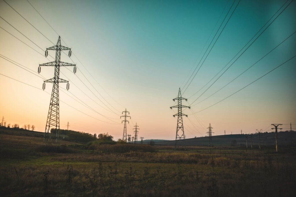 sunset behind power lines in vast Texas